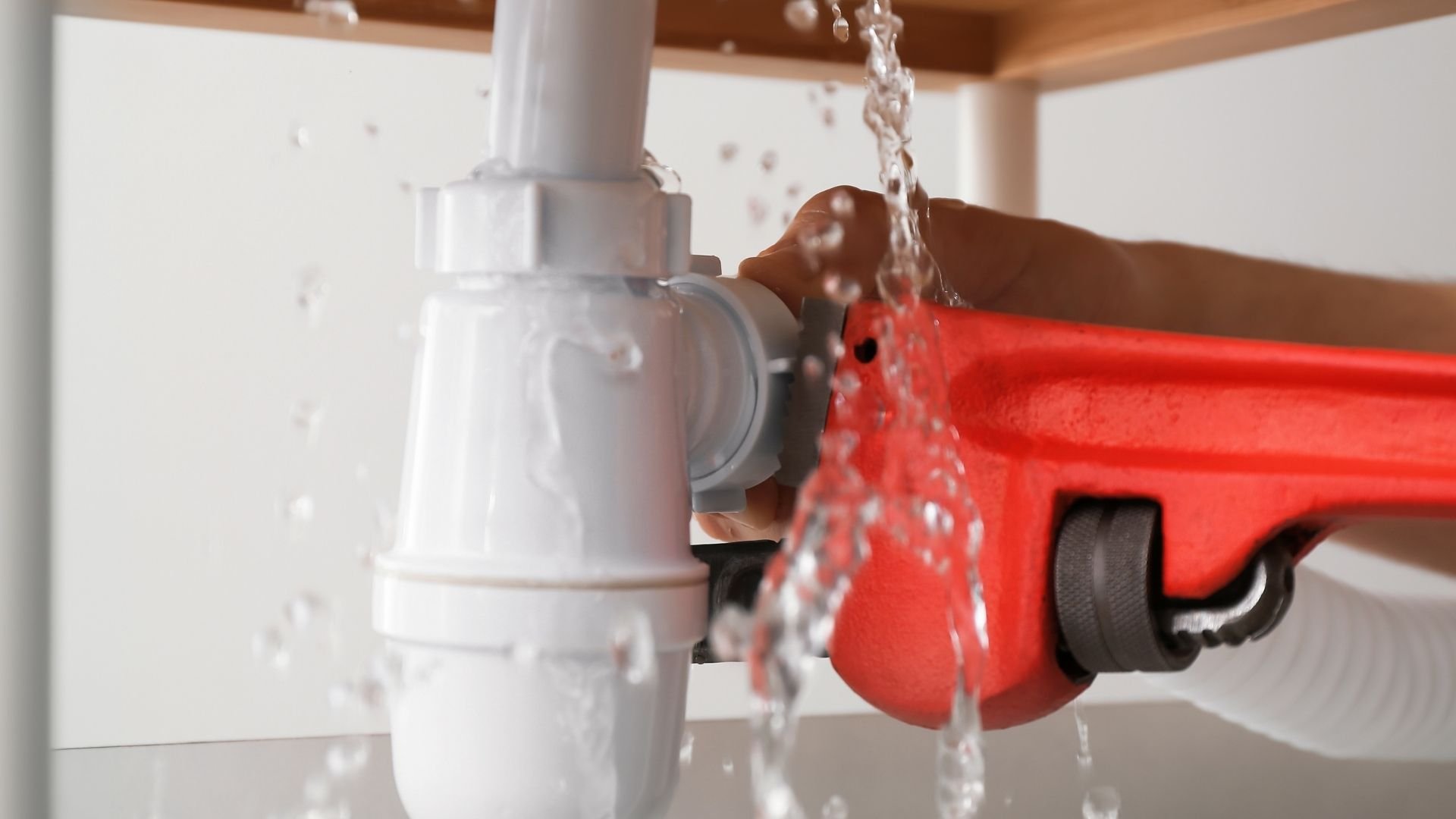 Water spraying from a pipe during emergency plumbing repair in North Hollywood CA